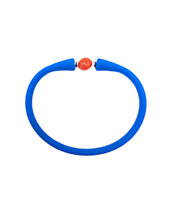 Bracciale artigianale in elastomero blu ed inserto in corallo Sciacca
